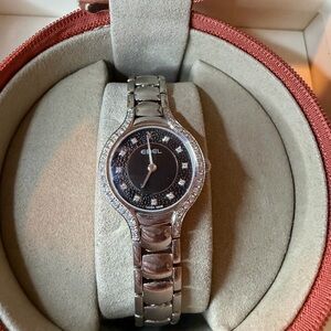 Ebel Stainless Steel and Black Caviar Dial Watch. 0.877 carat